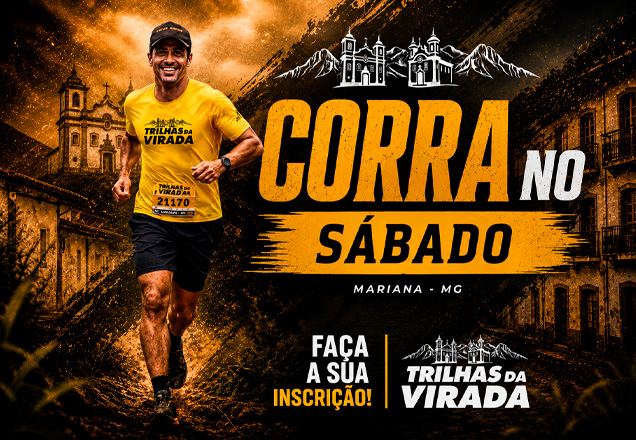 Corredor com a camiseta amarela da Trilhas da Virada em Mariana